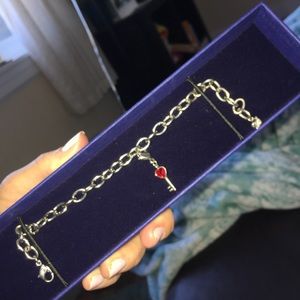 Swarovski charm bracelet with heart charm included